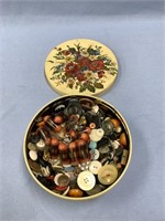 The iconic cookie tin full of buttons