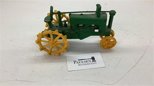 Rough cast toy tractor