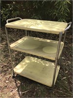 METAL THREE TRAY TABLE W/CASTERS