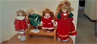 Porcelain dolls and wood doll bench