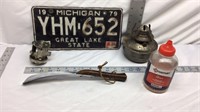 D1) LICENSE PLATE, OIL LAMP BASE, A FEW BB'S, ETC