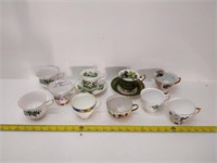 lot of tea cups - only 2 with saucers