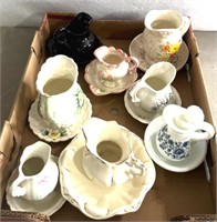 Variety of miniature wash basins and pitchers