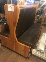 One large maple brown vinyl dual bench booth seat
