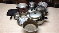 Large lot of pots and pans, cake molds