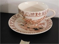 Cowboy roping cattle cup and saucer, has cattle