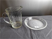 Clear glass pitcher and pie plate