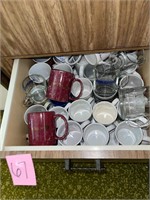 Drawer full of mugs