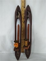 Shuttle candlestick sconces