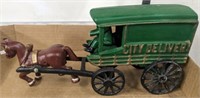 PAINTED CAST IRON DELIVERY WAGON AND HORSE