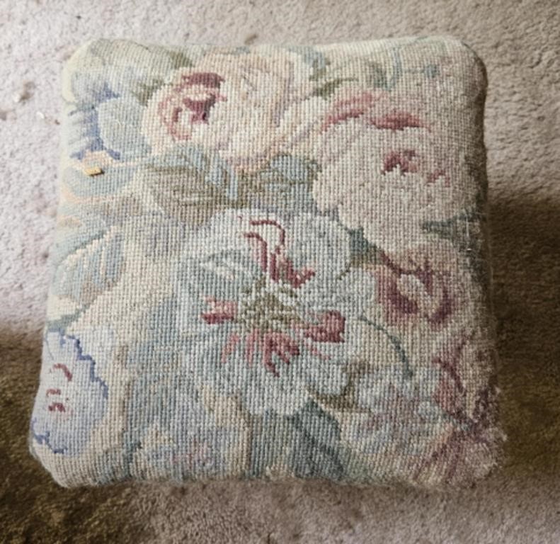 Cast iron upholstered foot stool