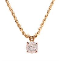A Lady's Diamond Pendant an Rope Chain in 14K