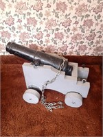 Small cannon on homemade stand. 
20" long