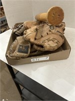 Flat with Vintage Baseball Gloves and Bat