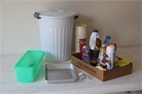 trash can, thermos, misc cleaning supplies