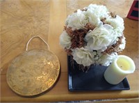 Brass gong, decorative candle, flower and tray