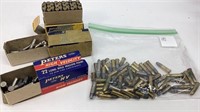 Partial boxes and loose .22 rim fire ammunition.
