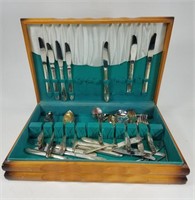 Silver utensils in wooden box