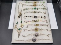 12 PIECES OF SILVER TONE GEMSTONE JEWELRY