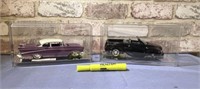 (2 PCS) PLASTIC DISPLAY CASES WITH A CAR IN EACH -