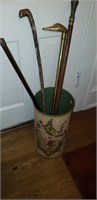 Assortment of Walking Canes in Asian Themed Tin