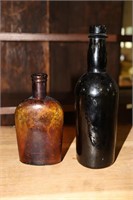 Amber/Brown Bottle Marked On Bottom With an S