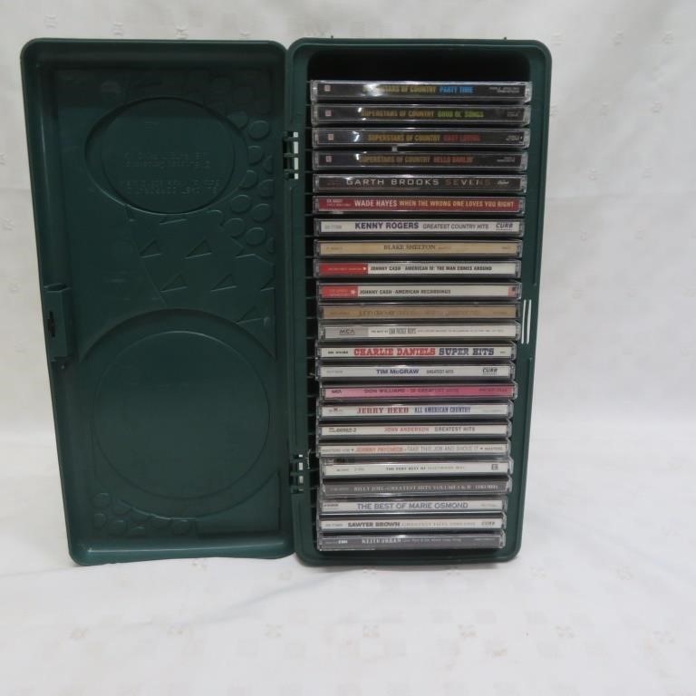 22 CDs in plastic case - assorted Country music