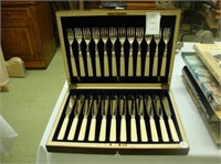 Edwardian box of cased cutlery.