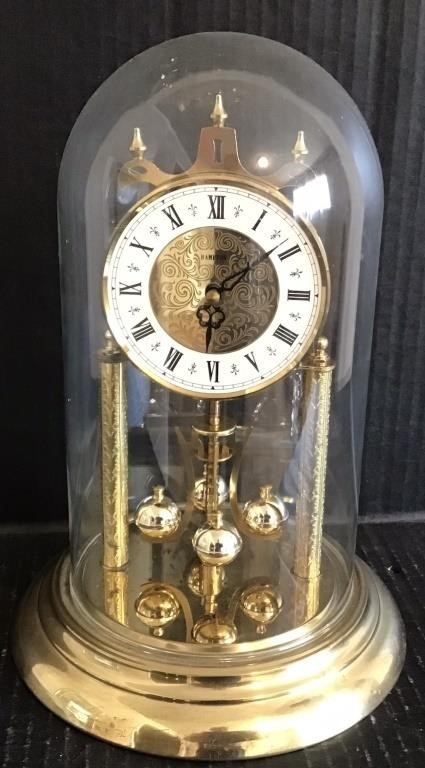 SWIVEL CLOCK UNDER GLASS