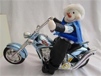 Mechanical Snowman On Motorcycle