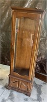 Wood lighted curio cabinet w/glass shelves  21x68