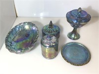 Lot of assorted blue carnival glass pieces.