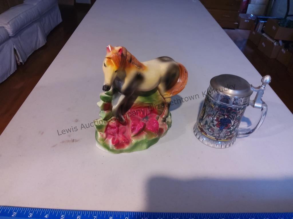 Chalk horse with chip on ear and beer stein