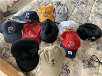 11 ASSORTED SPORTS CAPS