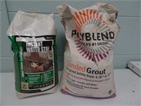 Bags of Grout and Water Sealer in Plastic Crate
