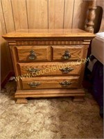 Solid oak three drawer nightstand