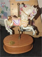 Musical carousel horse