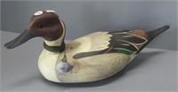 Wood carved duck decoy by Hadley Co. with weight,