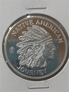 Silver dollar size native American journey coin