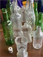 Pepsi-Cola, glass bottle, and other bottles
