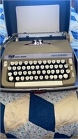 Smith Corona portable typewriter in carrying case