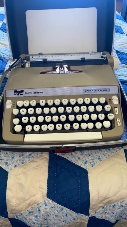 Smith Corona portable typewriter in carrying case