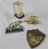 Souvenirs from multiple places including Alaska