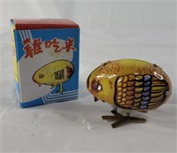 Metal pecking toy chicken, untested