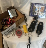Pepper spray, whistle, flashlight, measuring tape,