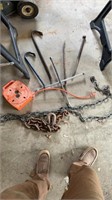 Extension cord, chains tire, iron crowbars