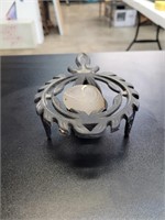 Cast iron candle holder