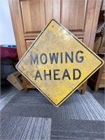 MOWING AHEAD SIGN