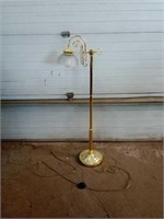 Beautiful gold-toned floor lamp. Measures 49"