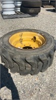 (1) 10-16.5 TIRE AND WHEEL FOR SKIDSTEER 8 HOLE